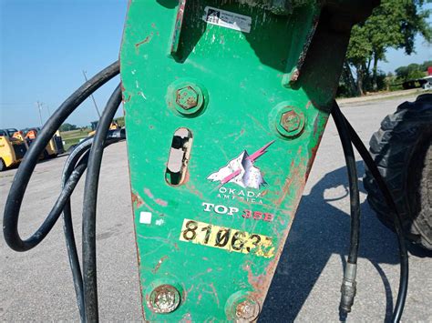 okada breaker on a 440 case skid steer|okada hydraulic breaker.